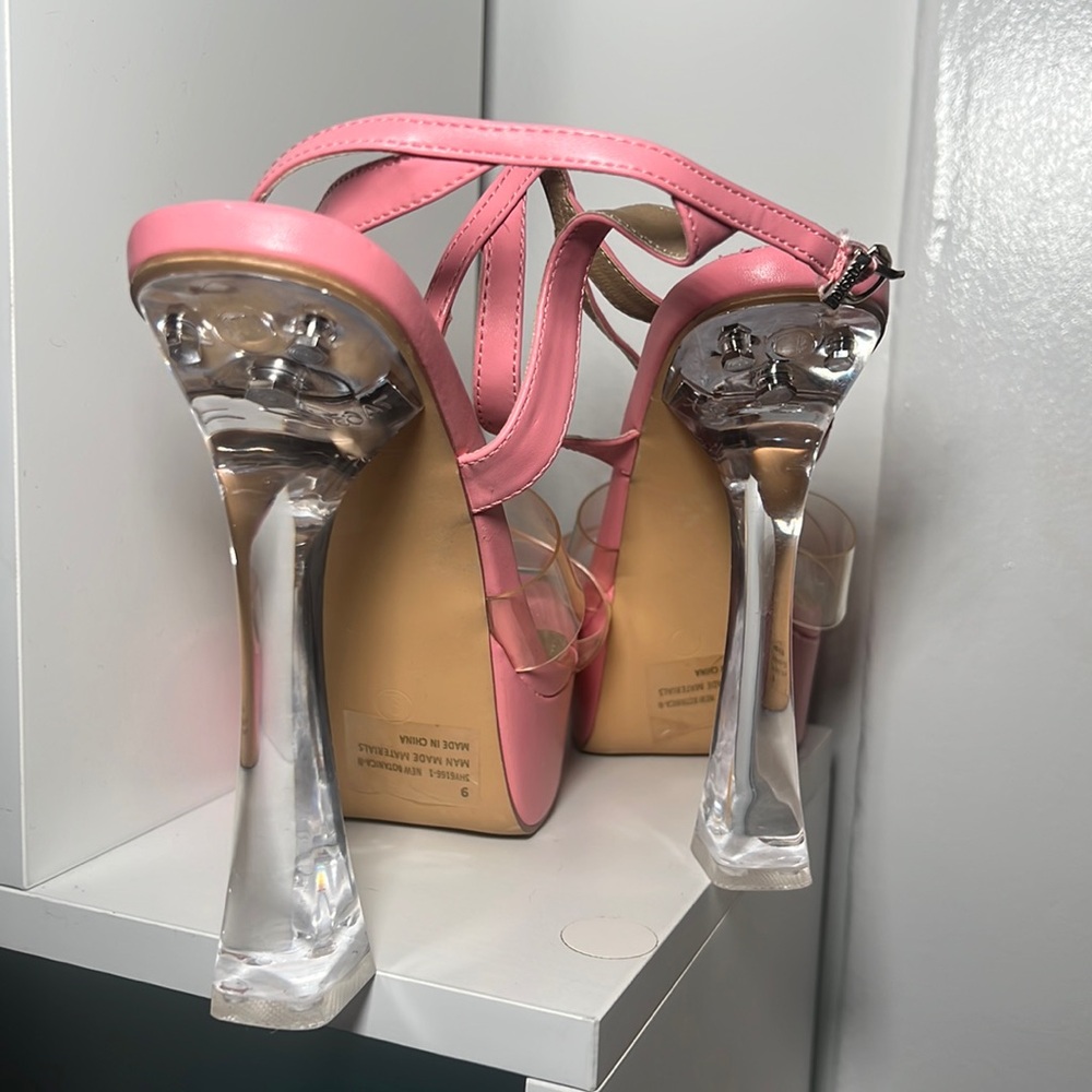 Size 9 Pink Platform Fashion Nova Heels only used for photoshoot. Light wear.